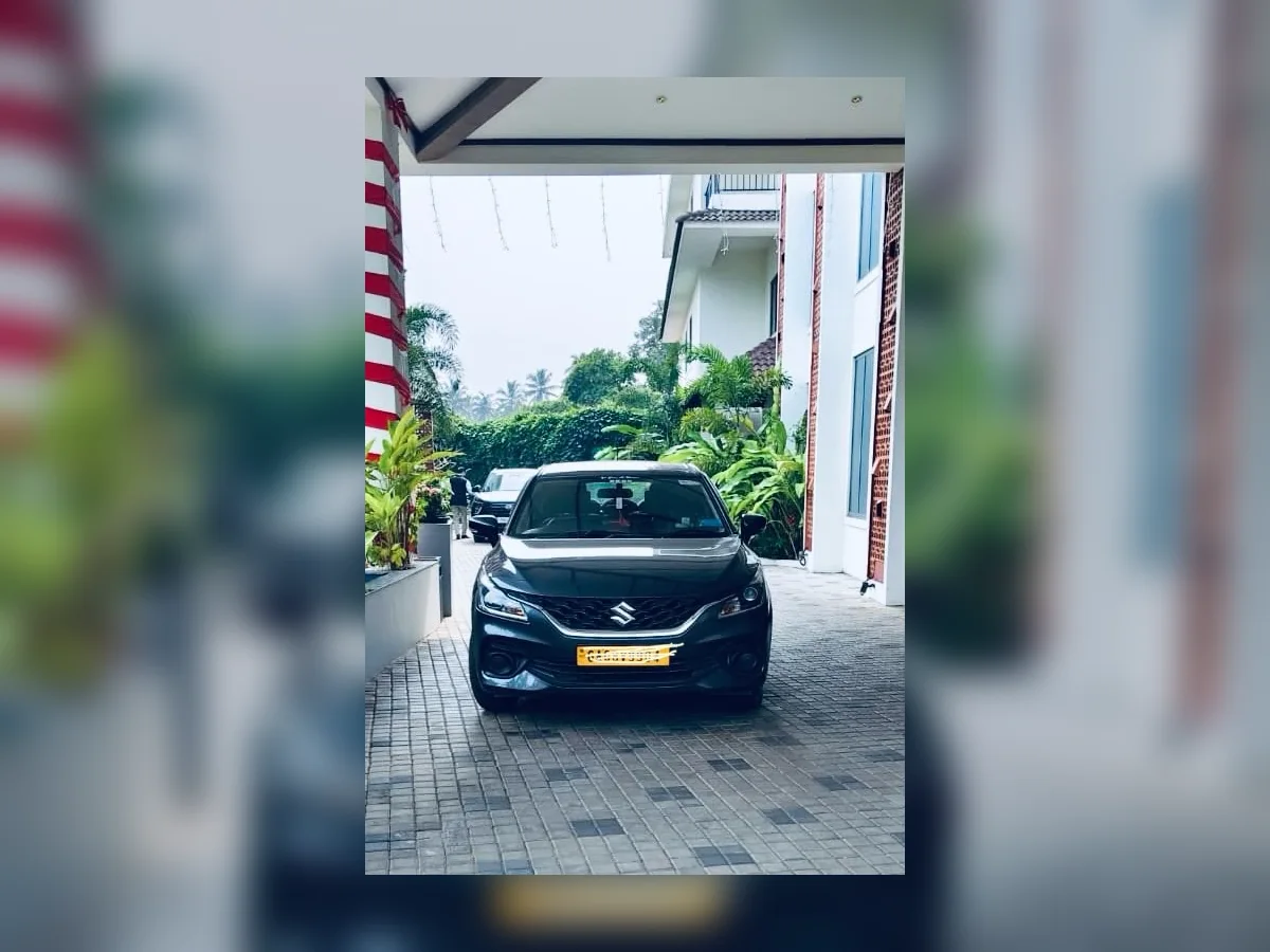 Maruti Suzuki Baleno taxi by DH Tours and Travels