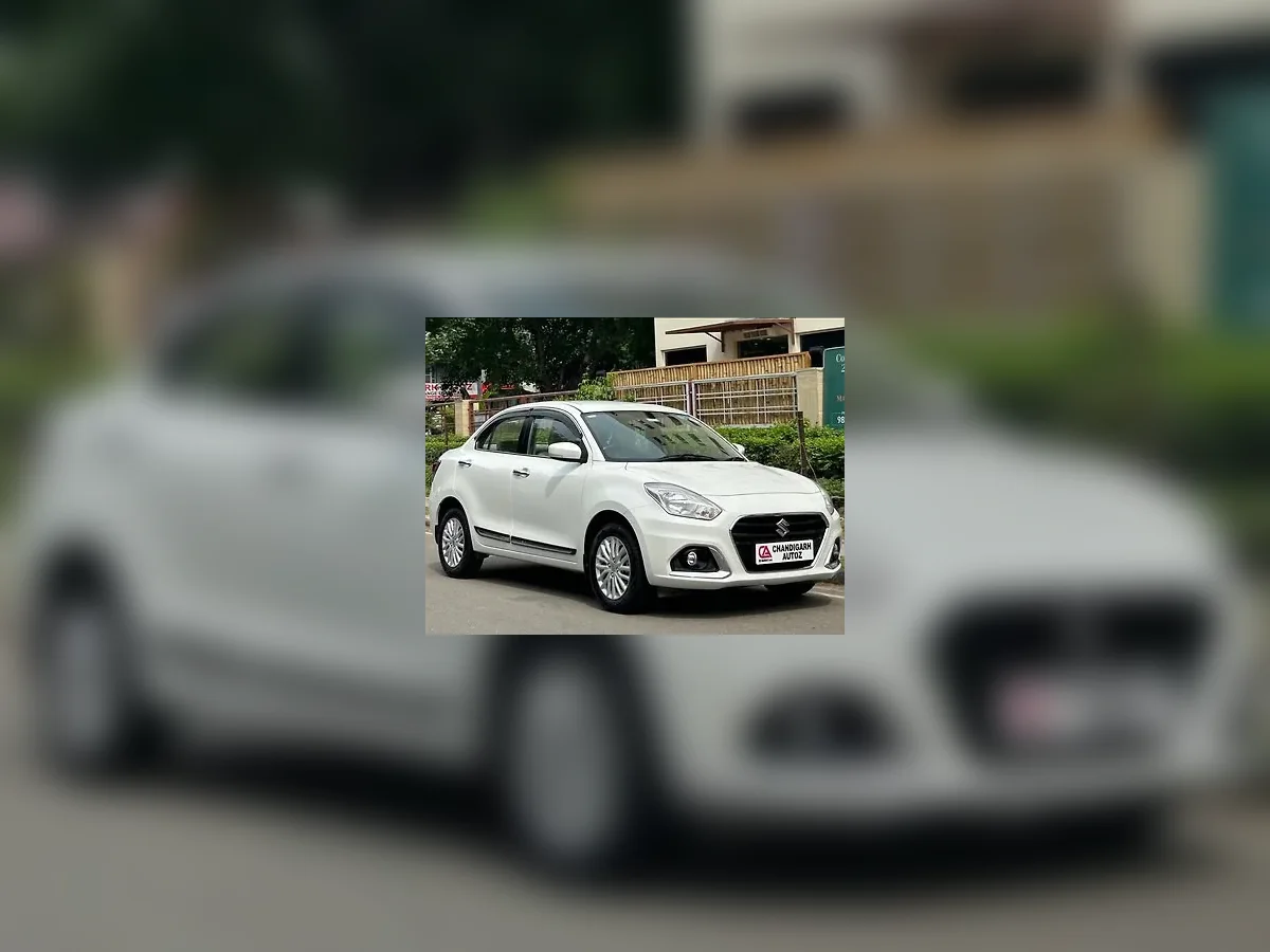 Maruti Suzuki Swift Dzire taxi by DH Tours and Travels
